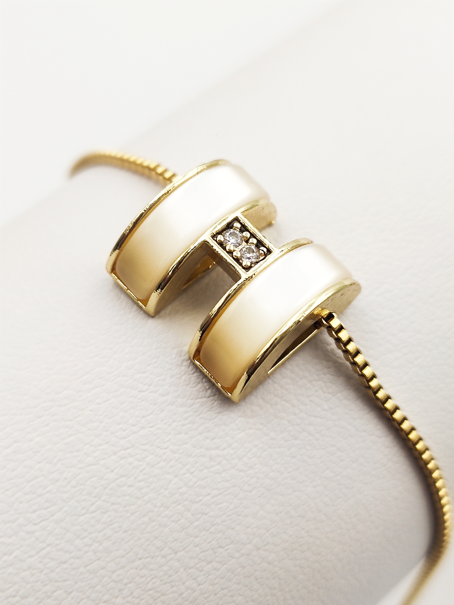 Titanium/Gold Plated H Designer Pendent & Chain set ($66 take away)